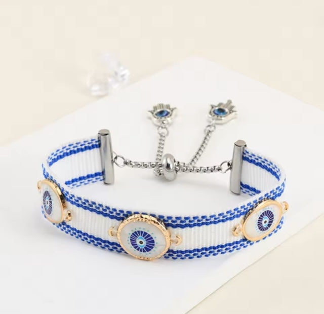 Cotton Handwoven Evil Eye bracelet with adjustable Stainless Steel Hamsa chain