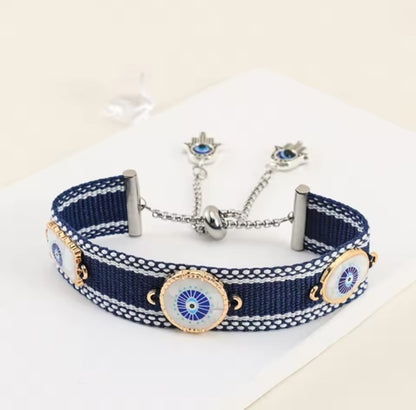 Cotton Handwoven Evil Eye bracelet with adjustable Stainless Steel Hamsa chain