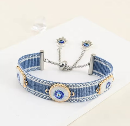 Cotton Handwoven Evil Eye bracelet with adjustable Stainless Steel Hamsa chain